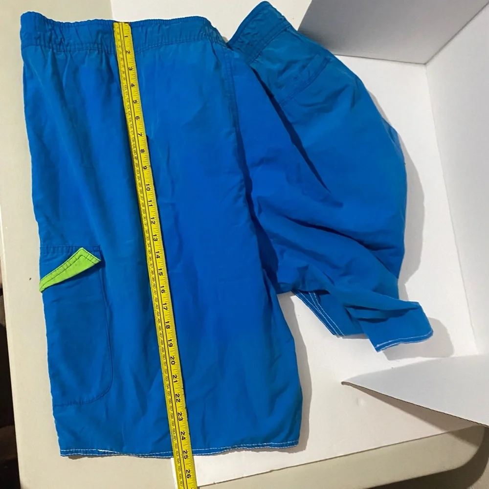 Men’s The Foundry Supply Co blue with green swim trunks. 3XL